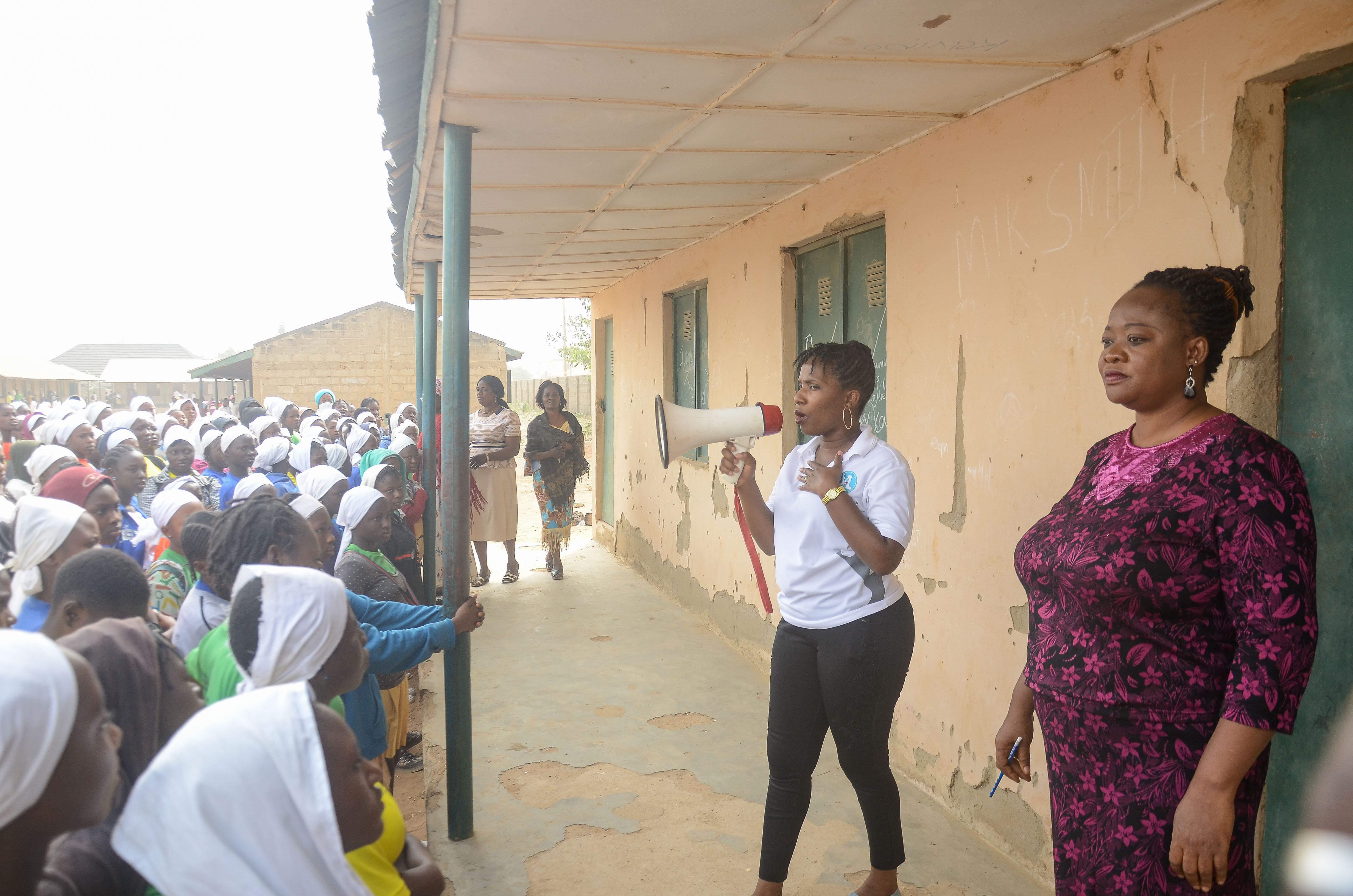Team Lead Henrietta Nonye educating the teenage girls. Anti-GBV. SRHR. Prevent HIV and Teenage pregnancy.