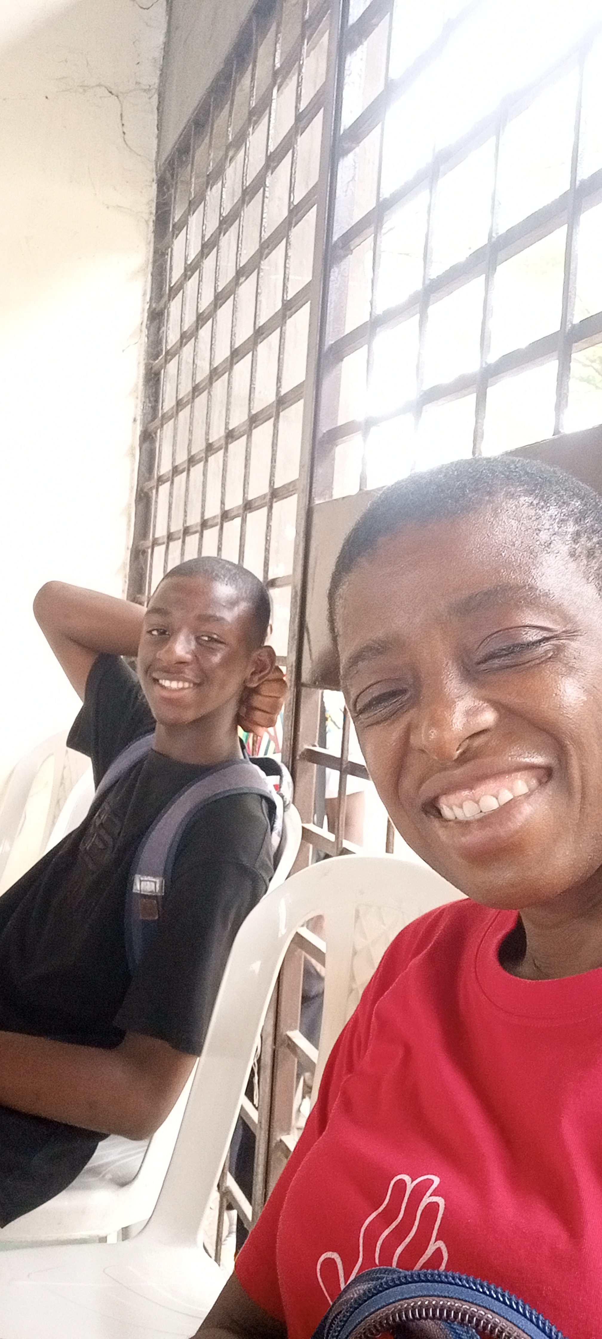 My son and I at his big brother's basketball game 