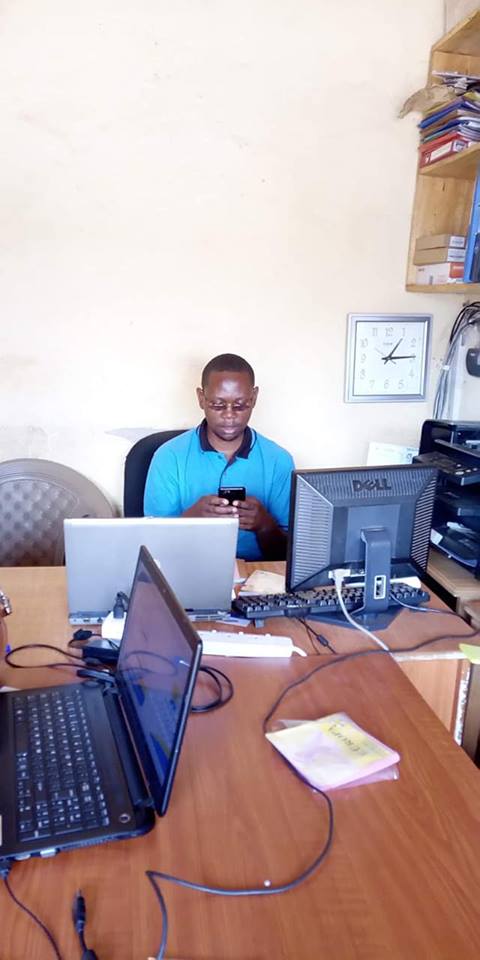 This is Kisubi Denis who participated in the WhatsApp discussion on Women's day from his office in Kampala.