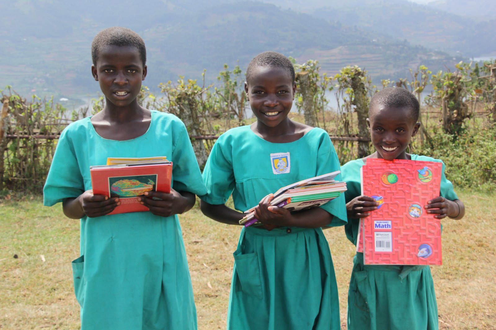 Students of Burimba happy to have access to Books and first time to have a Library (2015)