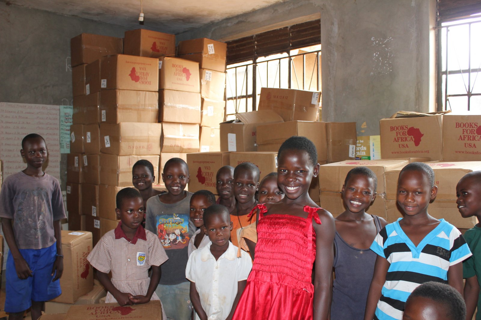 Students of St.Jude Primary school Pallisa receive Books. Pallisa District is one of the most affected in Uganda with high rates of Child Marriage