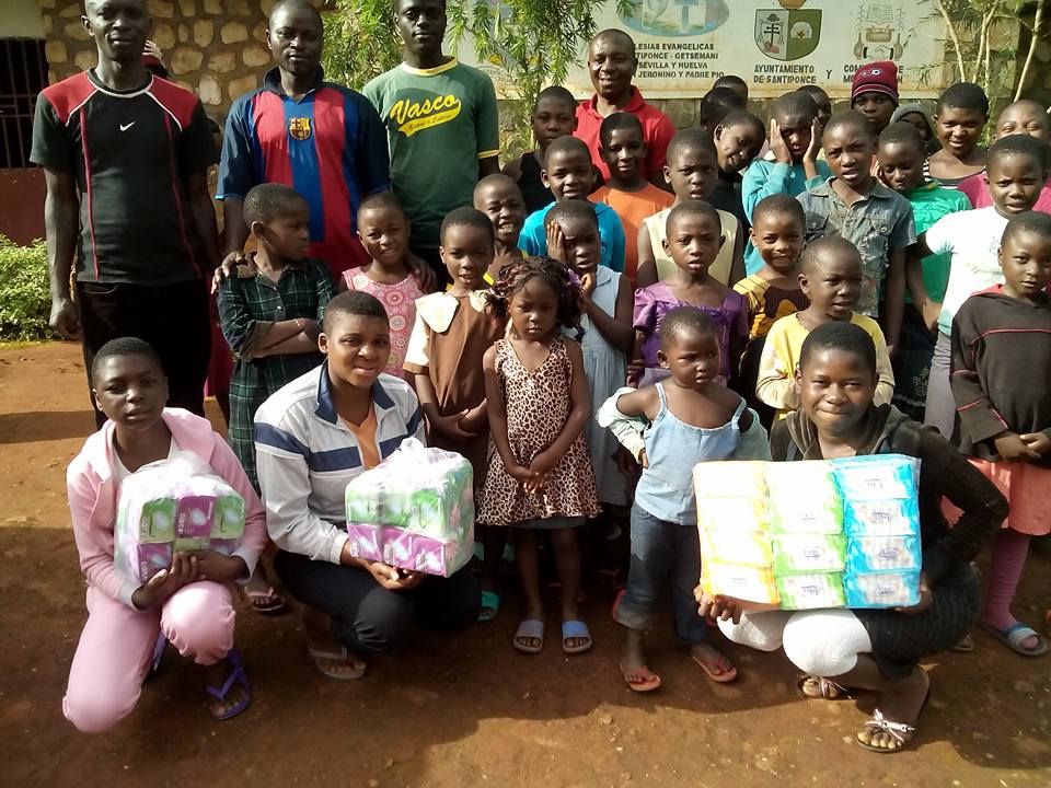 Posing with children including teenagers at the Mispa orphanage in Bamenda  North West region of Cameroon after an empowerment workshop on menstrual hygiene management and sanitary napkin donation.