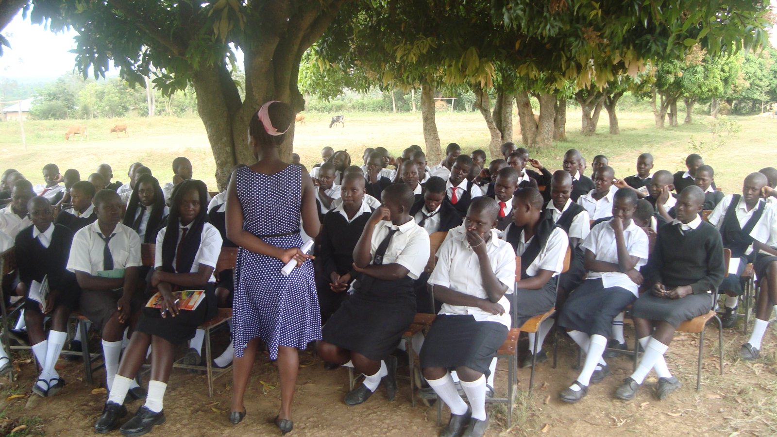 Adolescent girls of Malunga Secondary School following through a Mentorship Session facilitated by Joy.