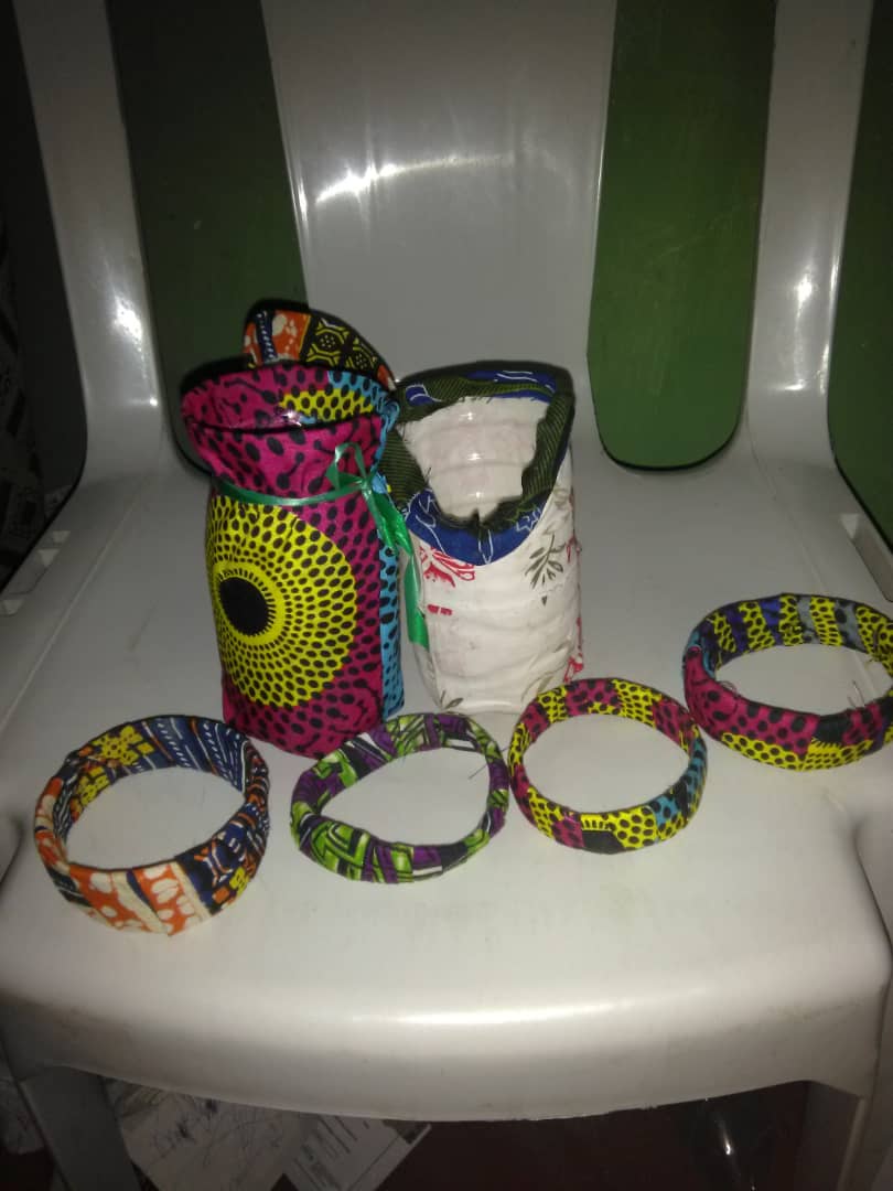 Wristbands and flower verse made with Ankara and plastic bottles