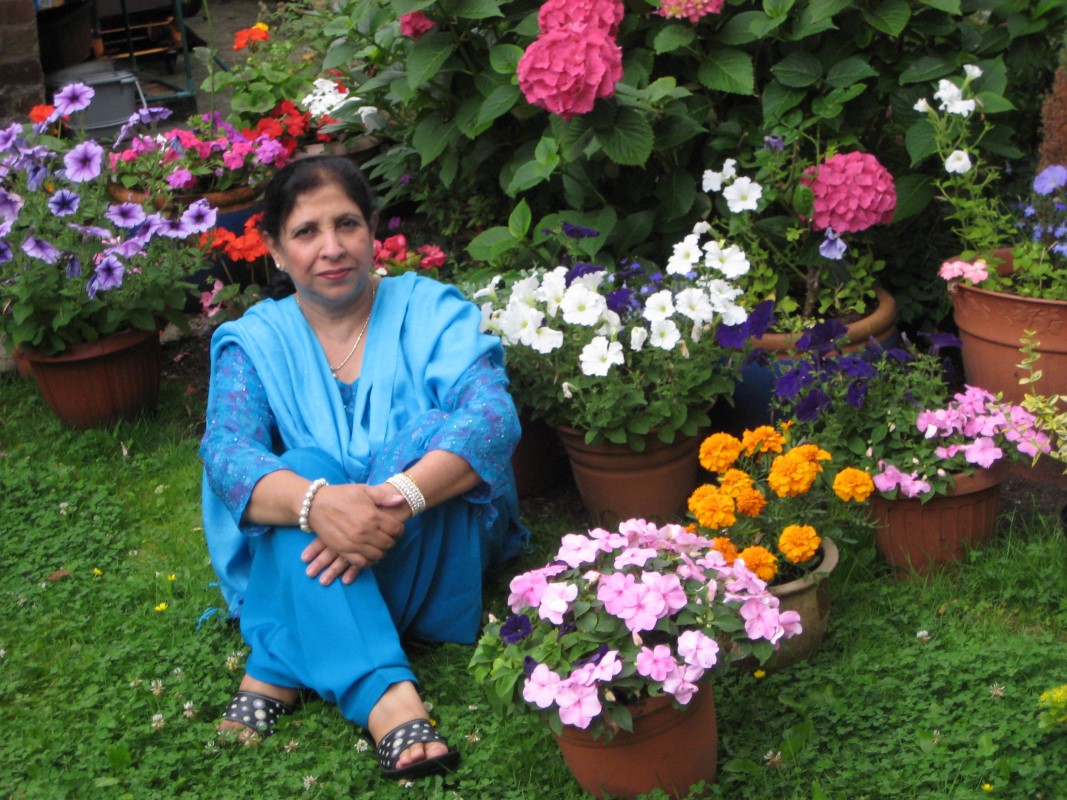 Mrs Meshar Mumtaz Bano in her garden, Manchester, UK