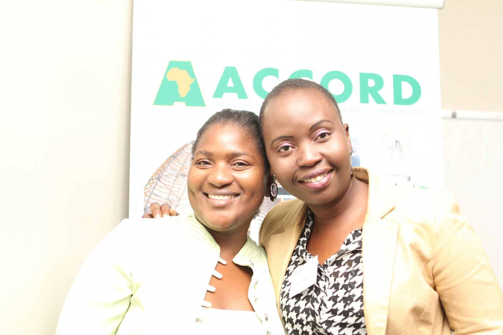 Sarah Murera, UNV Programme Assistant for UN Women and Dr Martha Mutisi, ACCORD Consultant side by side for peace