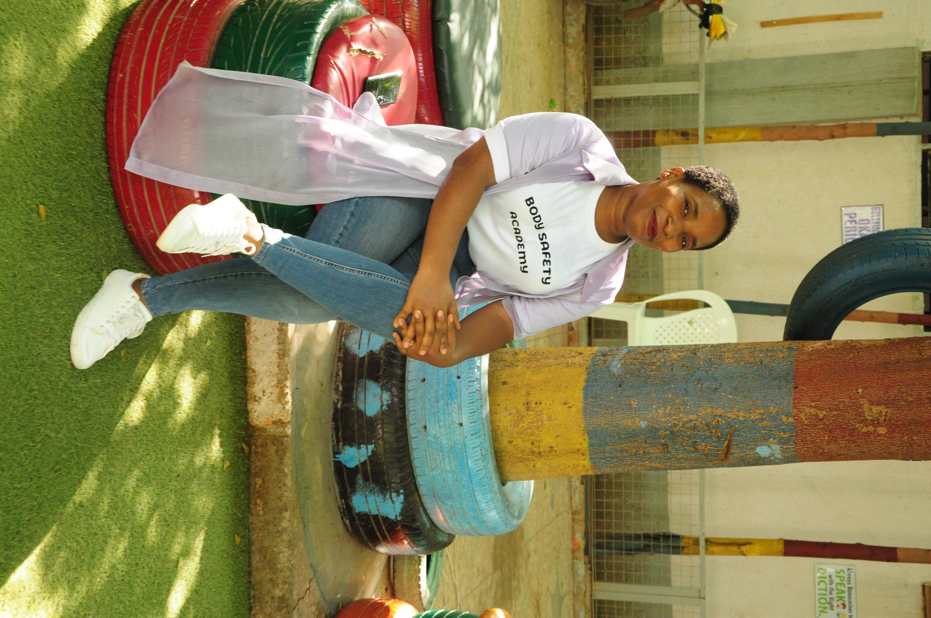 Henrietta Nonye Odey sitting after a #RaiseDontRuin outreach