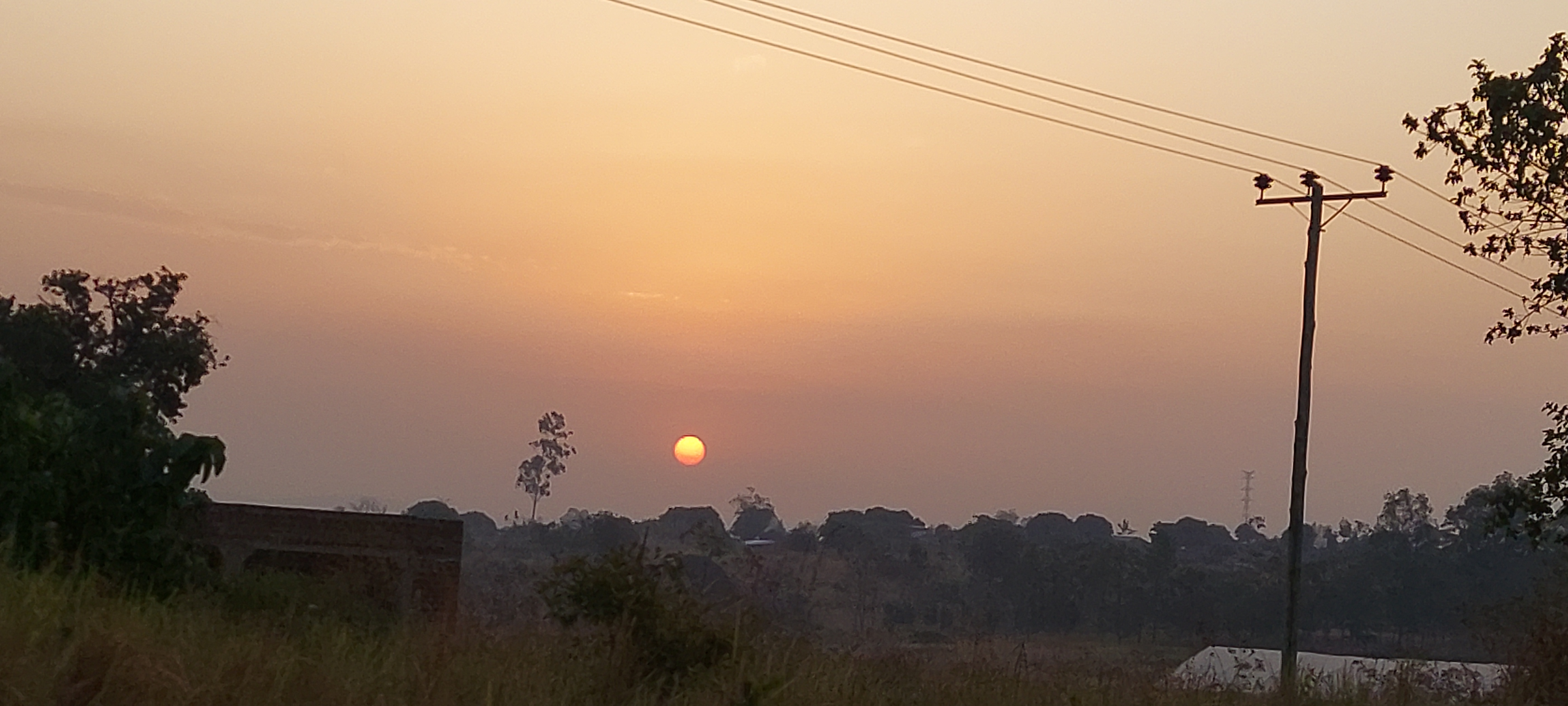 Sunrise over the hills of West Nile gives me hope.